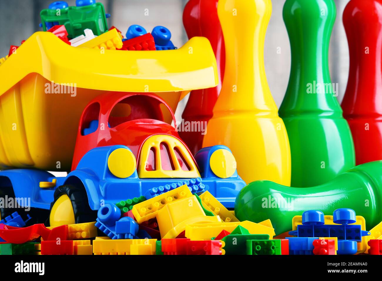 Colorful plastic toys in children's room Stock Photo