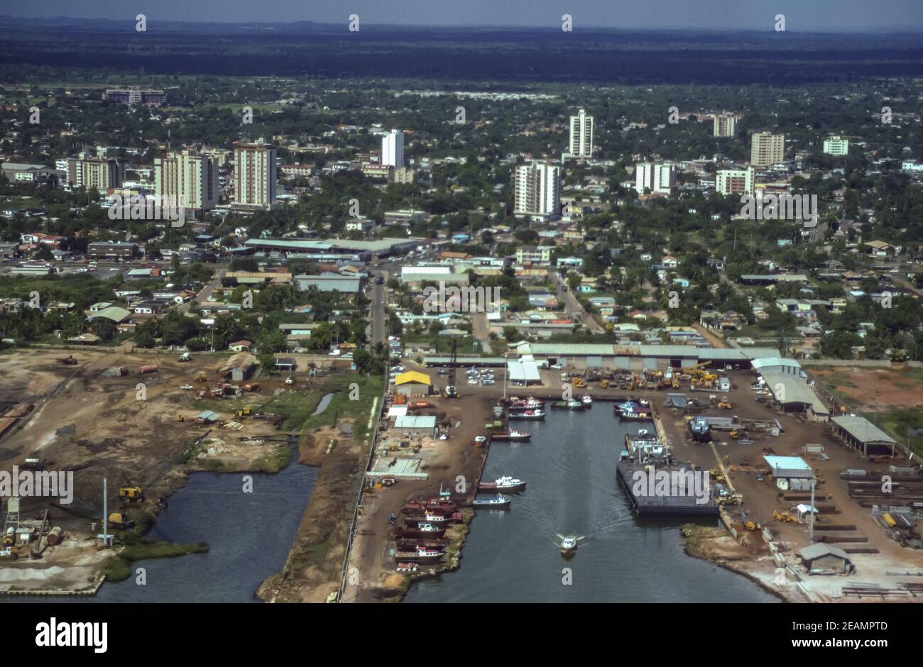LAKE MARACAIBO, VENEZUELA, OCTOBER 1988 - Aerial of Maracaibo waterfront and Lagoven oil company equipment, in Zulia State. Stock Photo