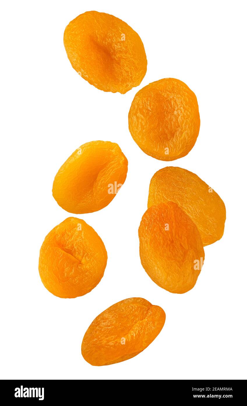 Dried apricot fruits isolated in the air on white background Stock Photo