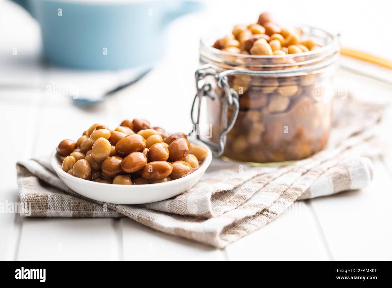 Mix of legume beans and chickpeas with sauce. Stock Photo