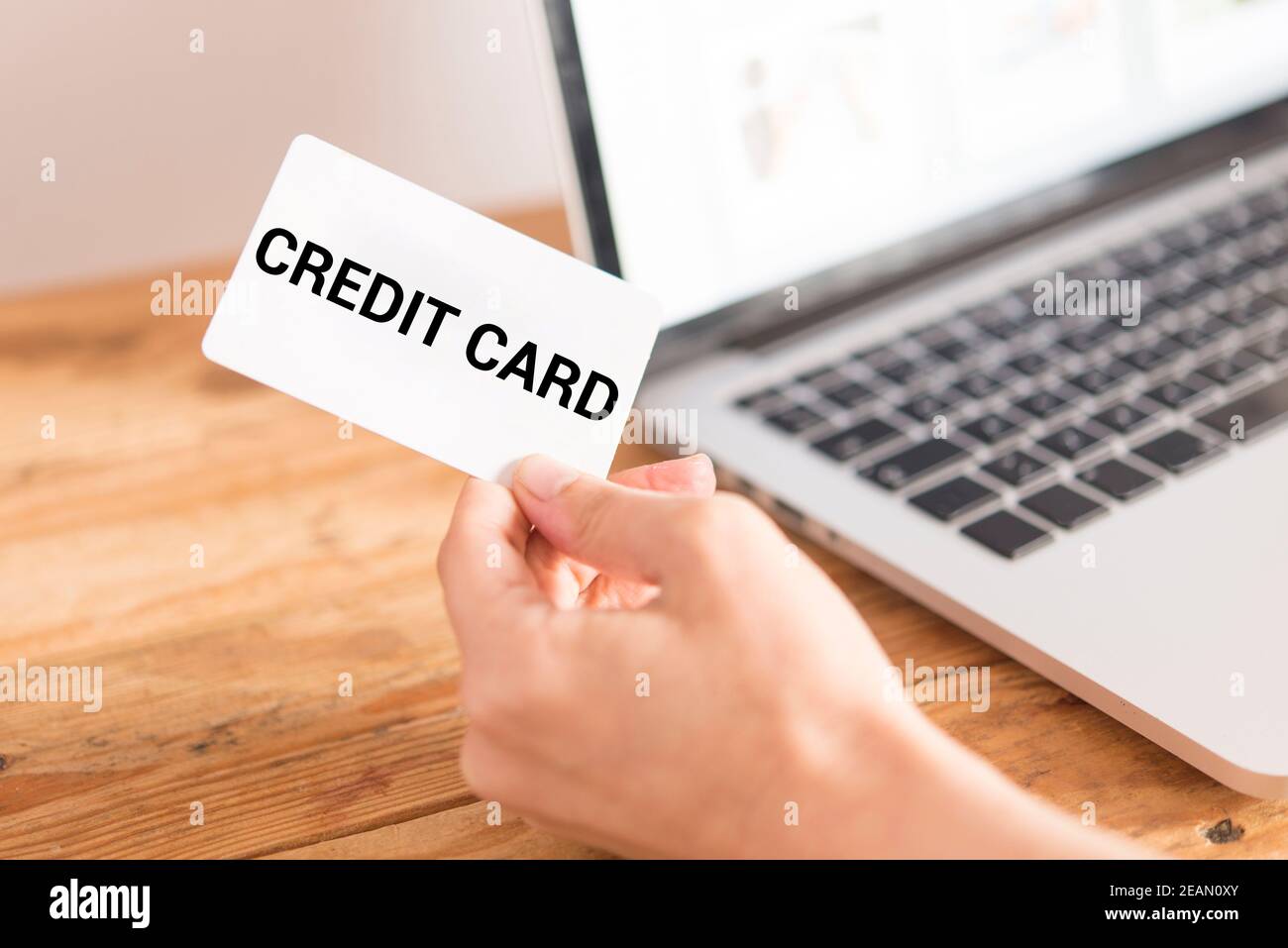 Top view of man using credit card for online shoping Stock Photo