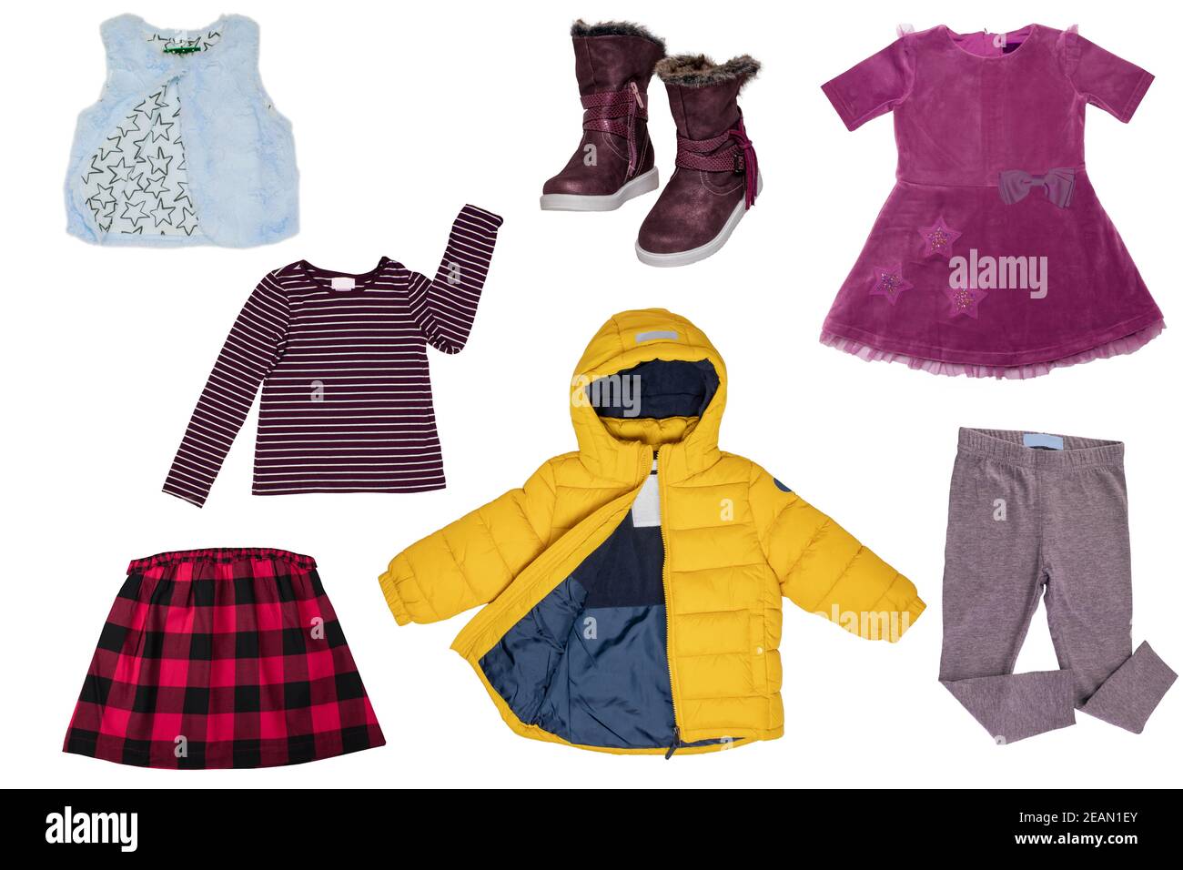 Collage set of little girl autumn clothing isolated on a white background. The collection of a stylish yellow down jacket, a fur vest, a sweater, a skirt, a dress and sweat pants and shoes. Kids winter fashion. Stock Photo