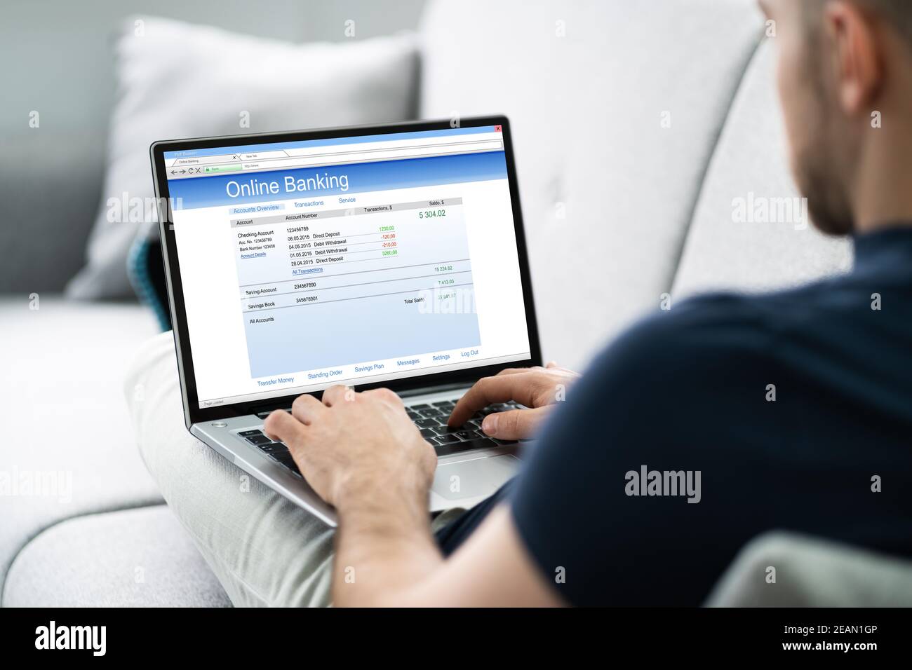 Man Using Online Bank Stock Photo