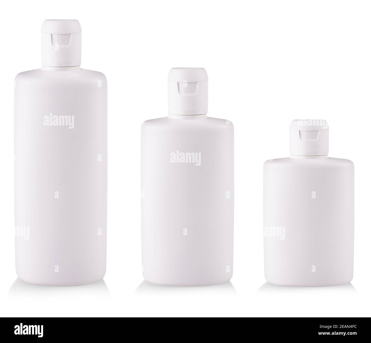 White Plastic bottles with soap or shampoo without label reflected on white background Stock Photo