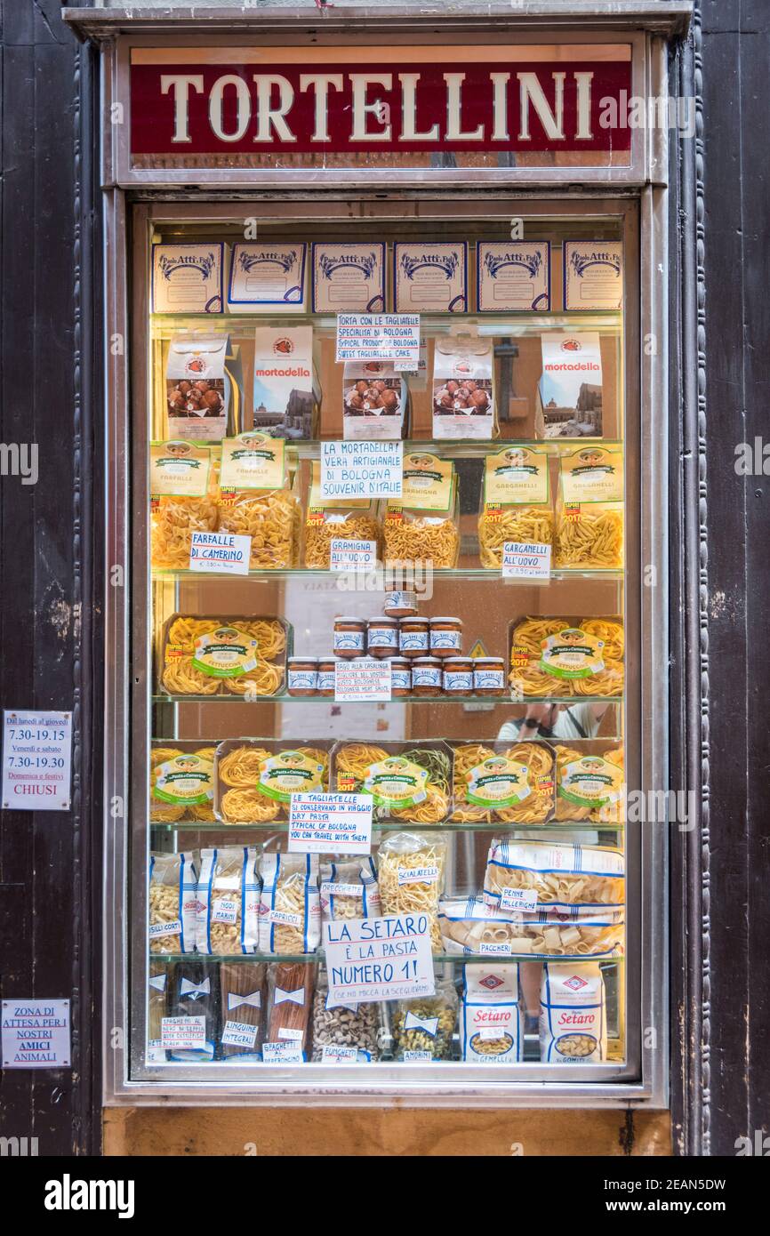 A shop window display of tortellini and italian pasta at Tamburini delicatessen Bologna Italy