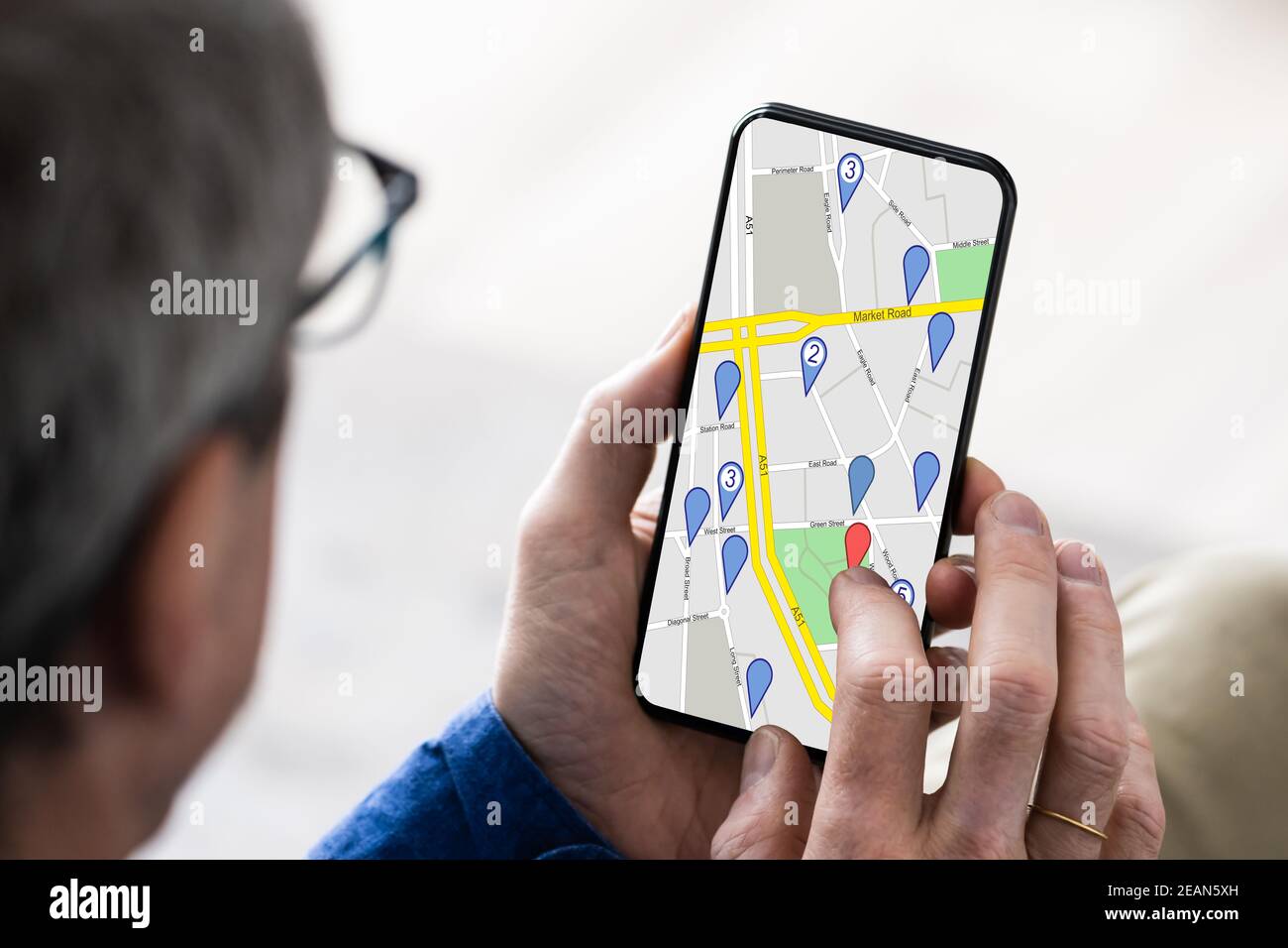 Looking Up Online GPS Location Map Stock Photo Alamy