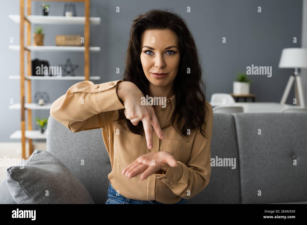 Adult Learning Sign Language Stock Photo Alamy