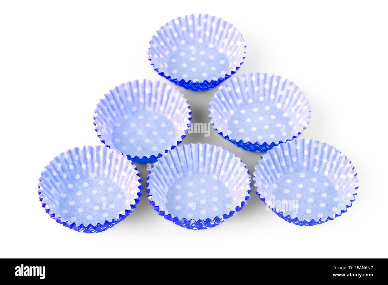 blue polka dot cupcake paper cup isolated over the white background Stock Photo