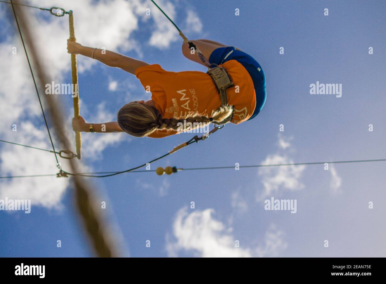 Girl on the trapeze Stock Photo
