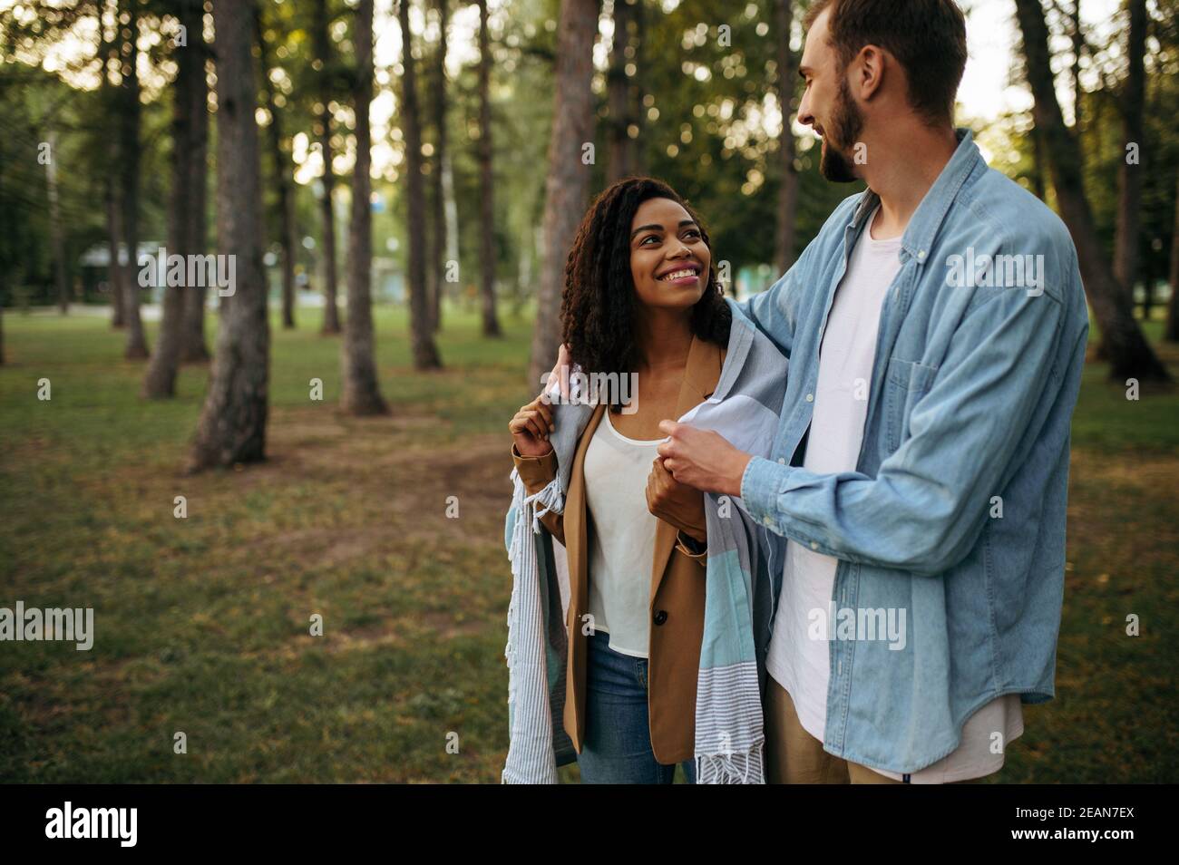 Love couple hugging, romantic walking in the park Stock Photo - Alamy