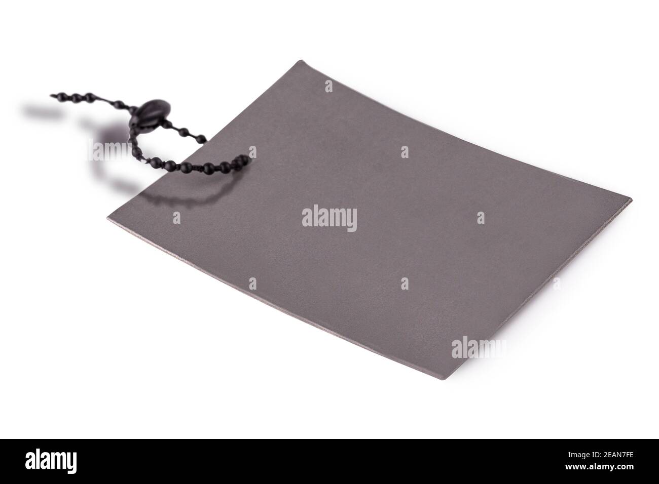 Blank tag tied with string. Price tag, gift tag, sale tag, address