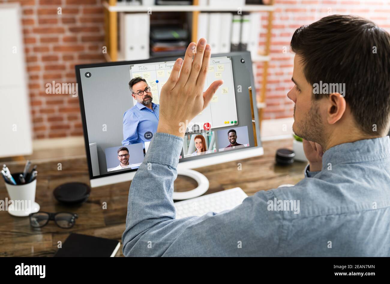Raising Hand To Ask Questions Stock Photo Alamy