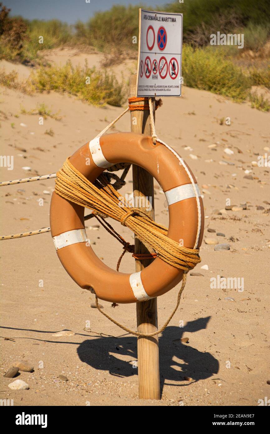 Life buoy attached to the pole Stock Photo