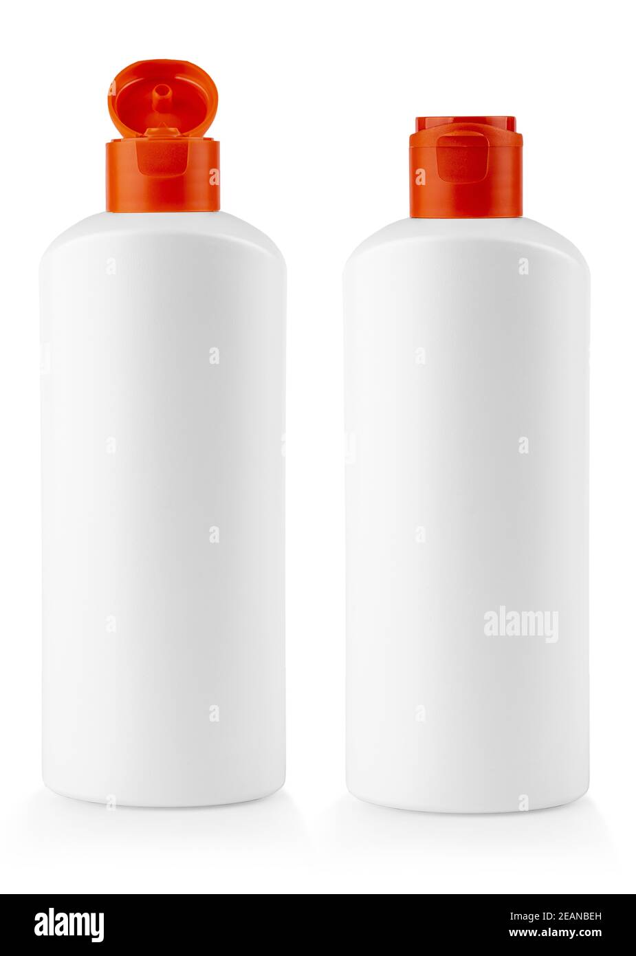 white plastic bottle with red cover with shampoo on white background Stock Photo