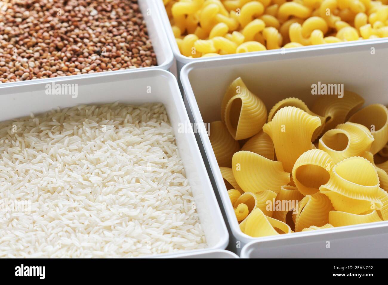 Rice, noodles, oats and buckwheat in a box. Food supplies Stock Photo