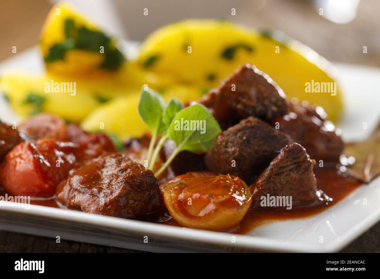 greek stifado meat stew with potatoes Stock Photo Alamy