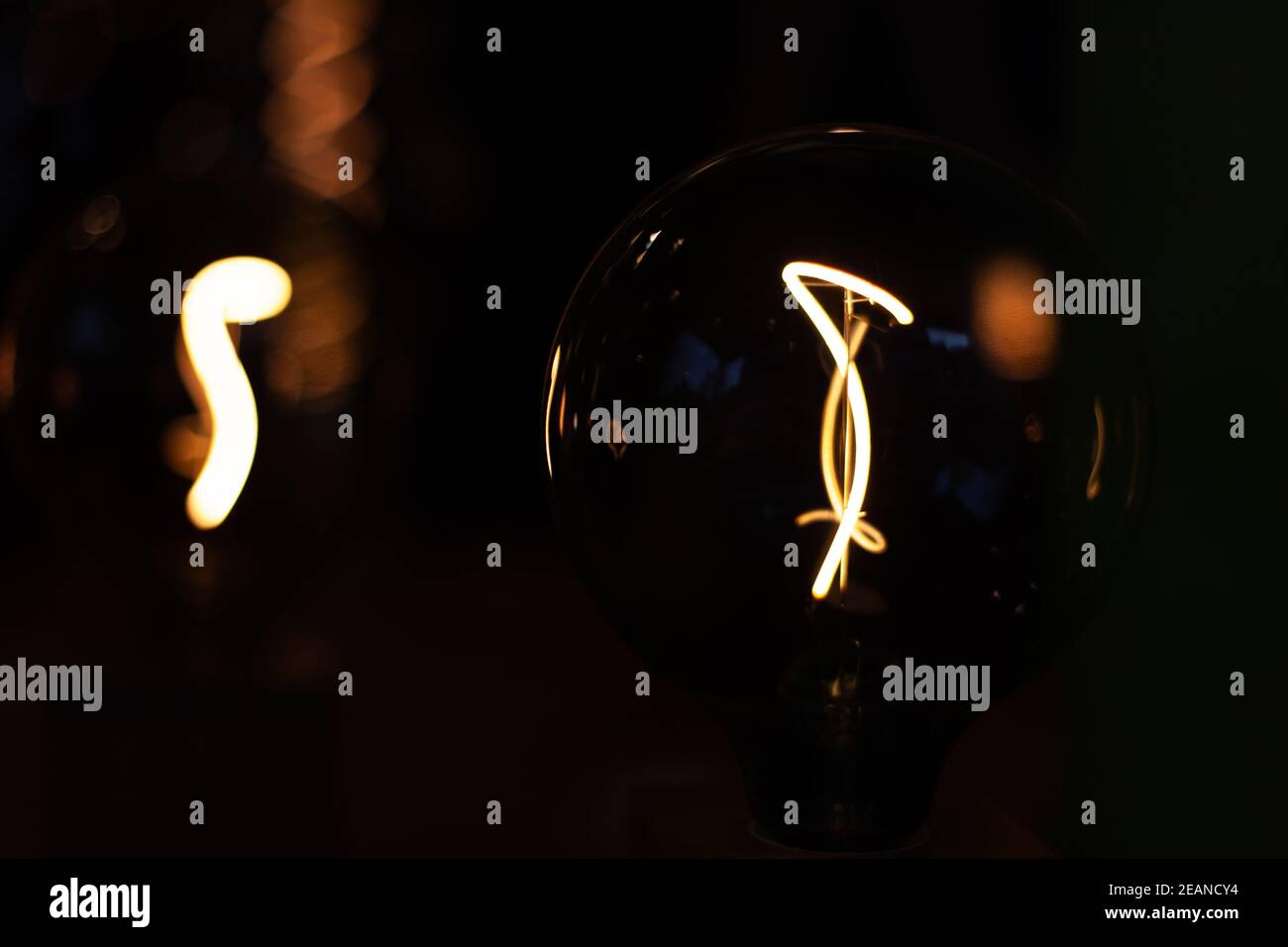 heated wire in an electric light bulb Stock Photo