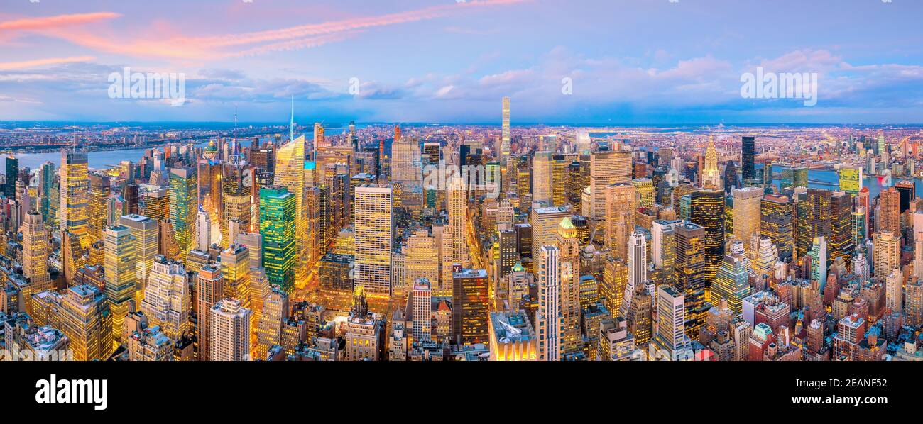 Aerial view of Manhattan skyline at sunset, New York City Stock Photo ...