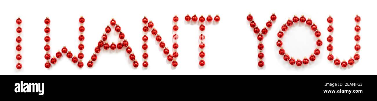 Red Christmas Ball Ornament Building Word I Want You Stock Photo - Alamy