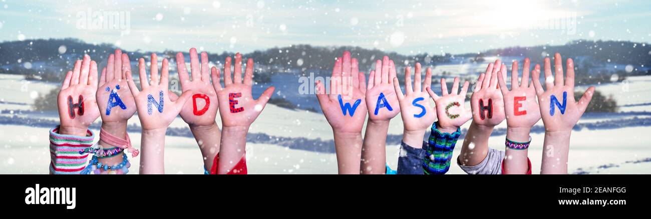 Kids Hands Holding Haende Waschen Means Wash Your Hands, Winter Background Stock Photo