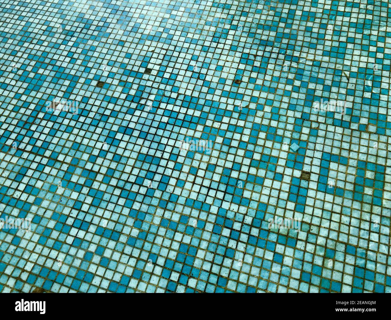 Abstract mosaic on the ground of a pool with blue tiles Stock Photo - Alamy