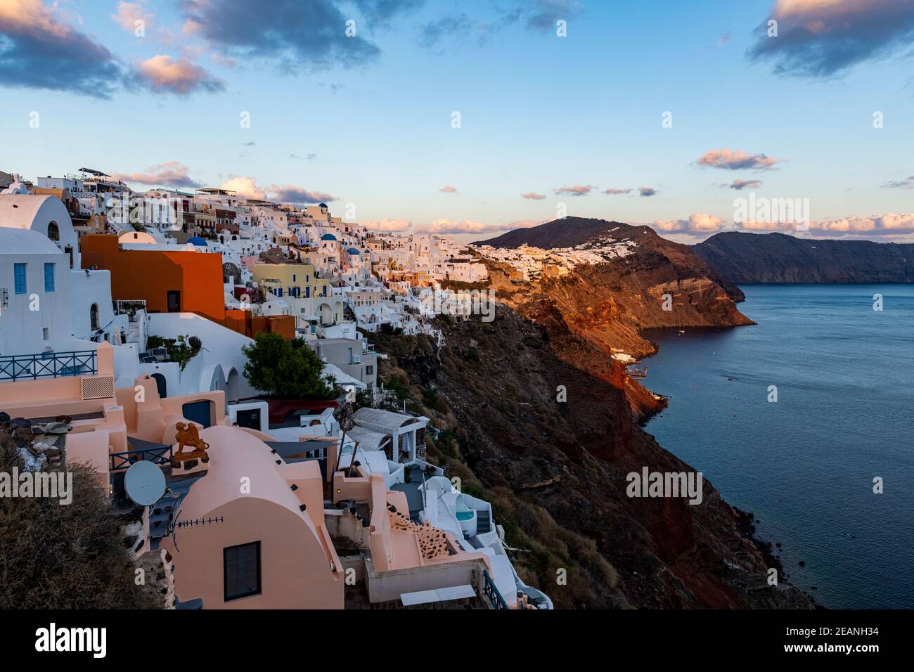 Whitewashed architecture at sunset, Oia, Santorini, Cyclades, Greek Islands, Greece, Europe Stock Photo
