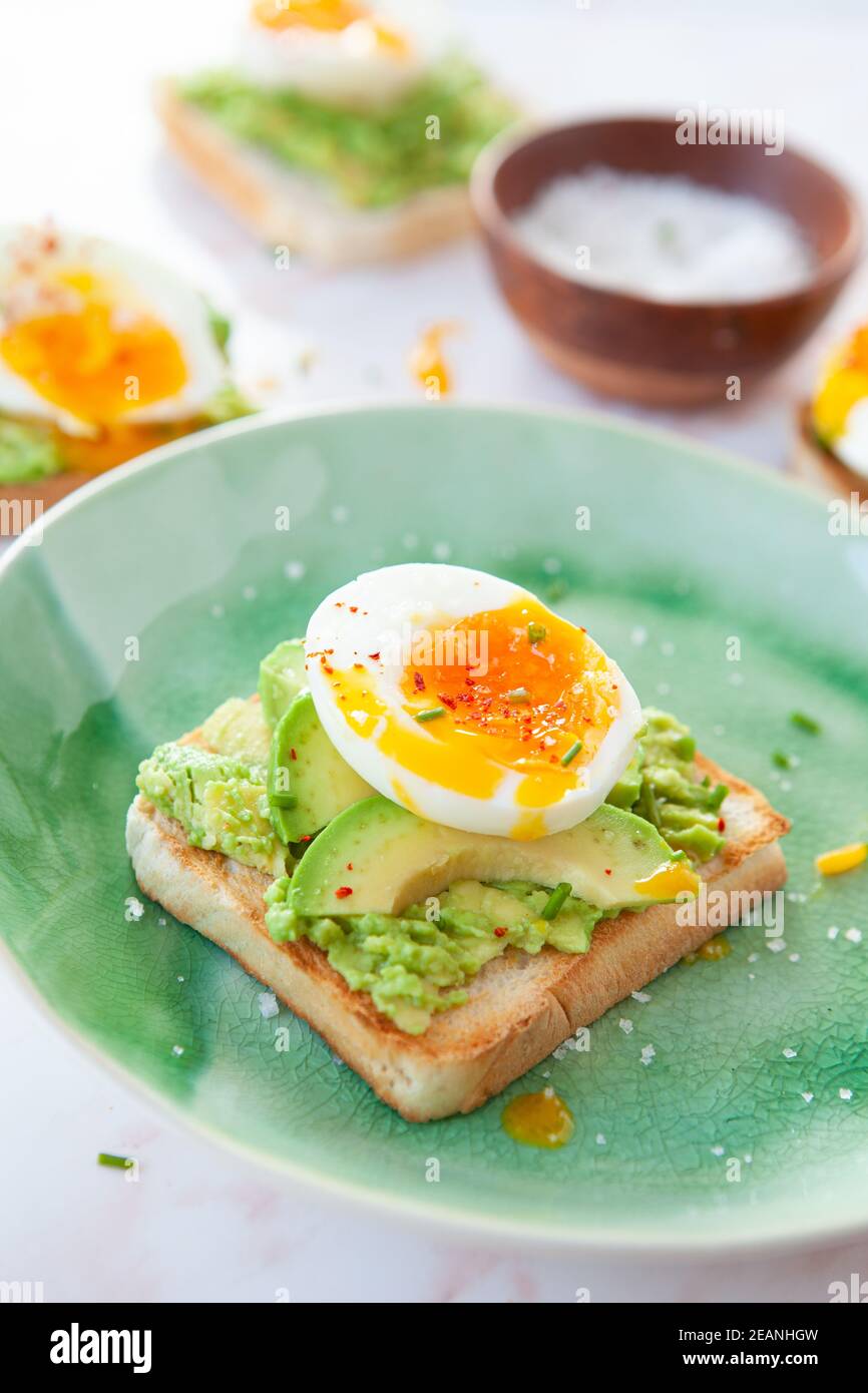 Delicious avocado toast Stock Photo