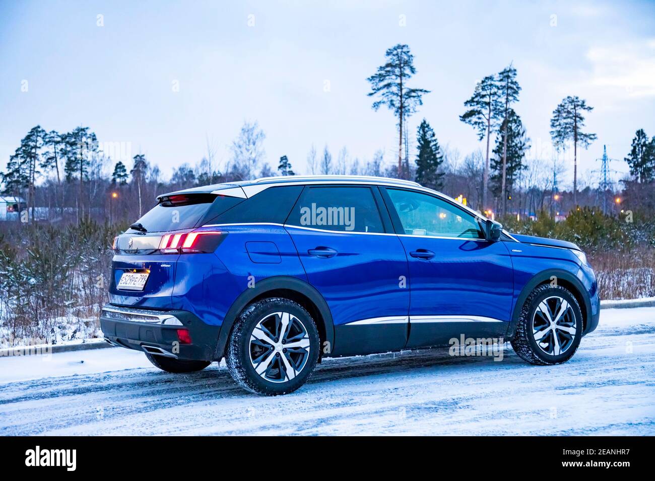 MOSCOW, RUSSIA - MARCH 15, 2020: side view of Blue SUV Peugeot 3008 on on  winter countryside landscape Stock Photo - Alamy