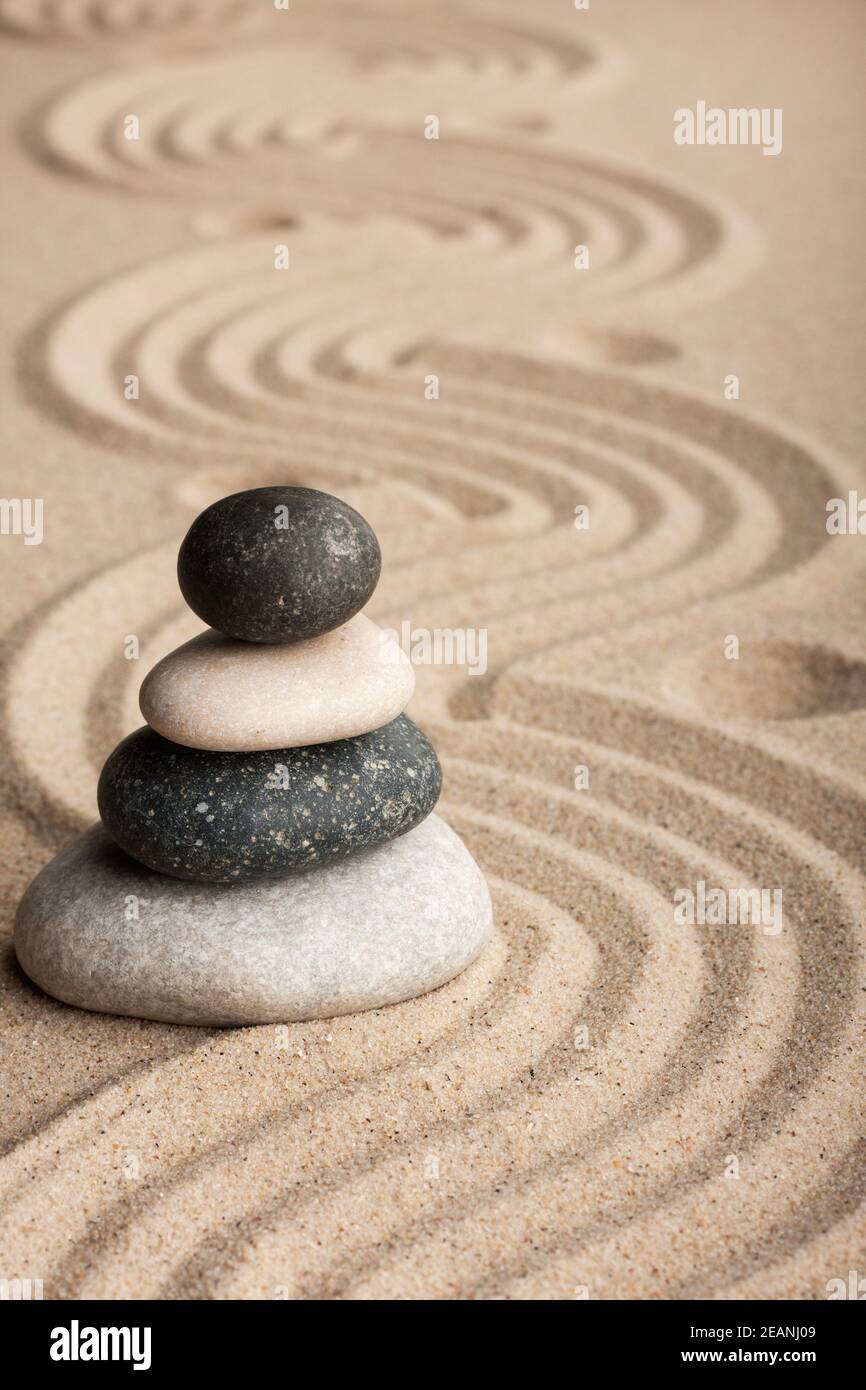 Pyramid made of stones standing on the sand Stock Photo Alamy