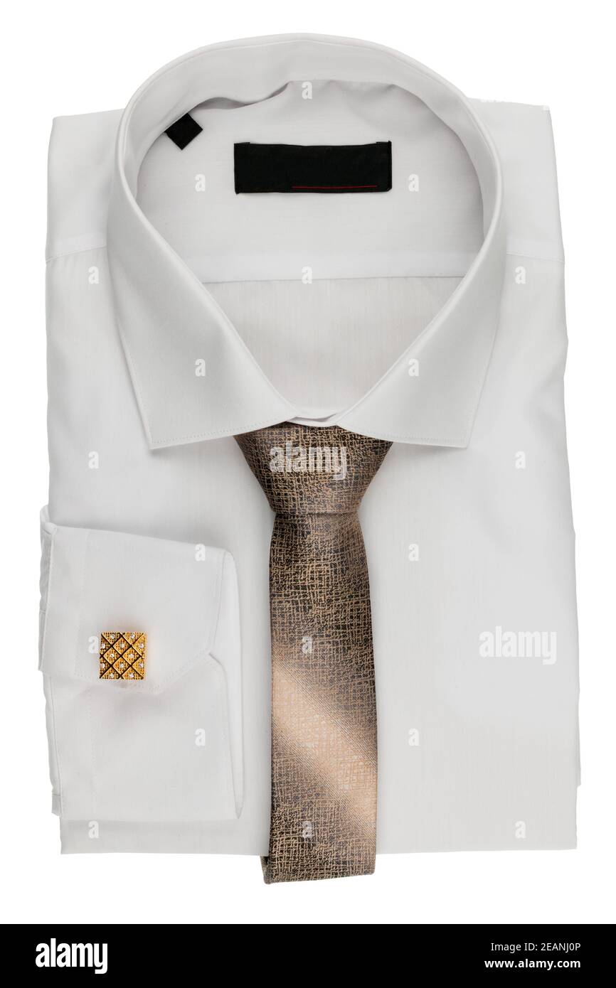 Folded white shirt with a tie and cufflinks Stock Photo