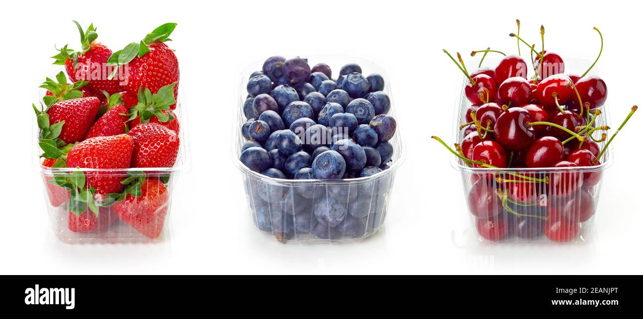 Blueberry, cherry and strawberry in plastic transparent container box, isolated on white background Stock Photo