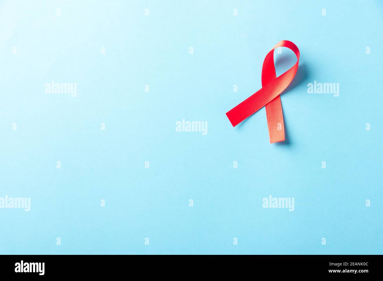 Red bow ribbon symbol HIV, AIDS cancer awareness Stock Photo