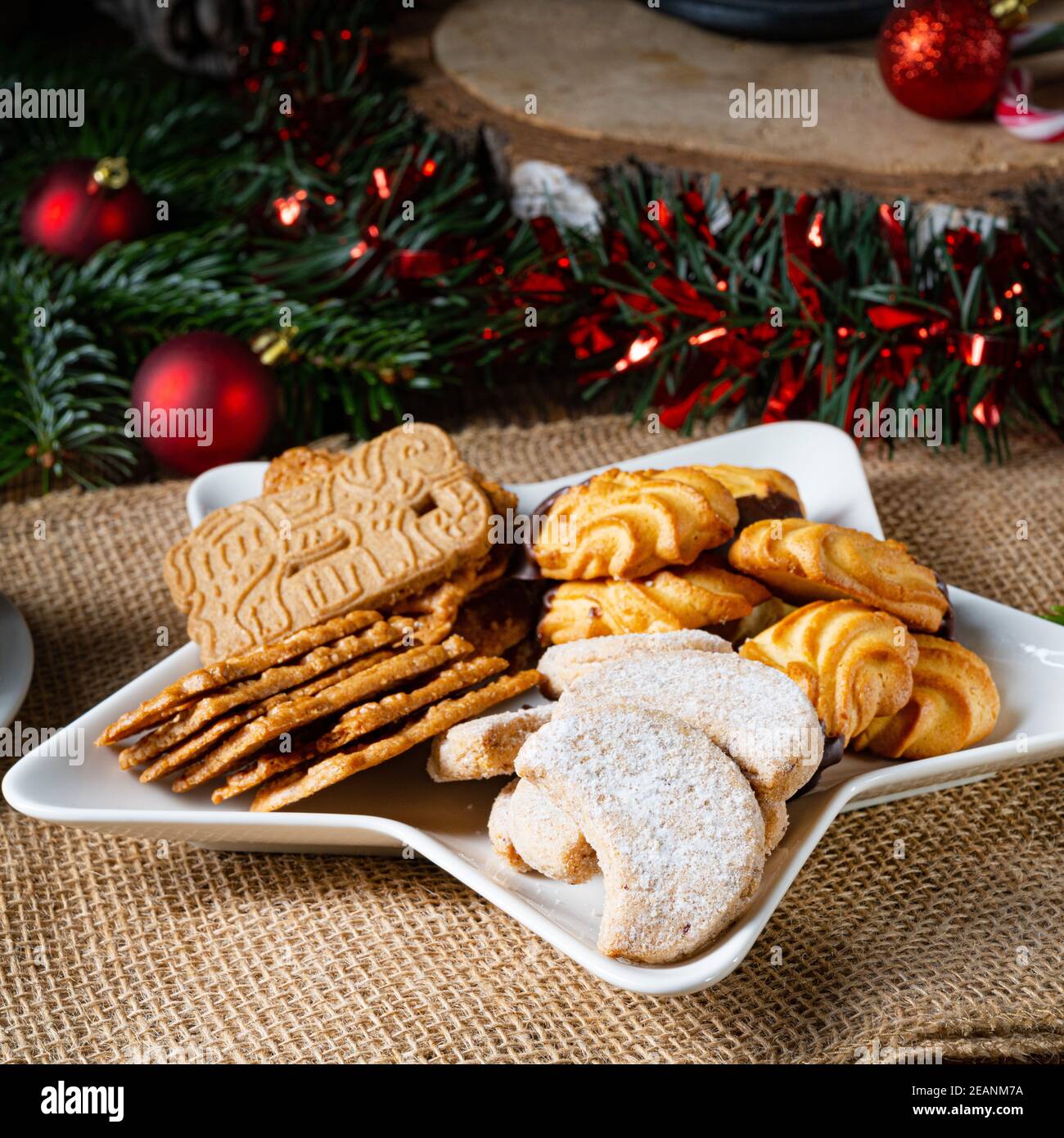 Different types of biscuits with rustic Christmas decorations Stock Photo