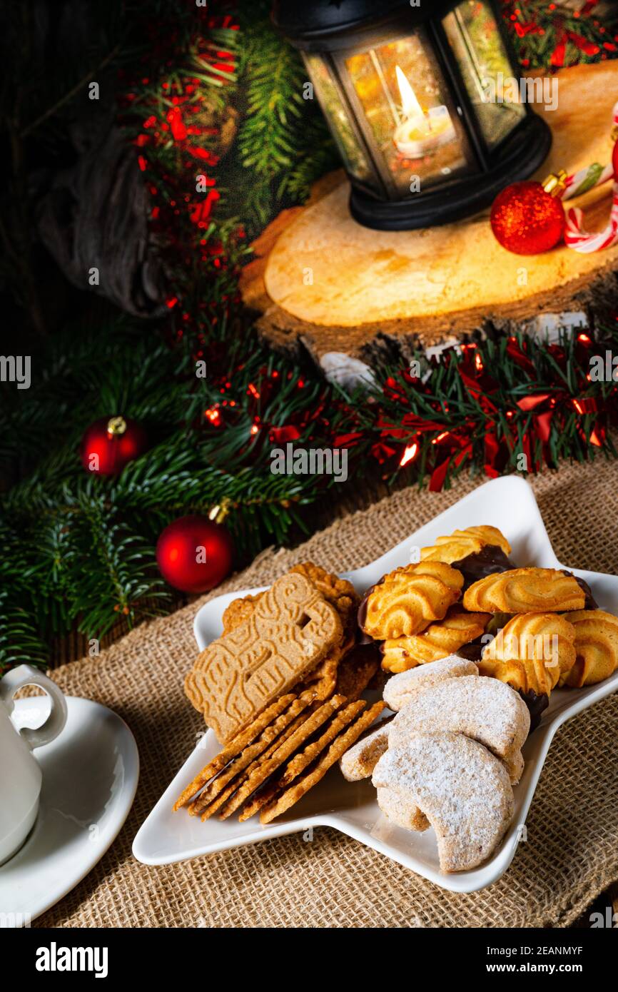 Different types of biscuits with rustic Christmas decorations Stock Photo