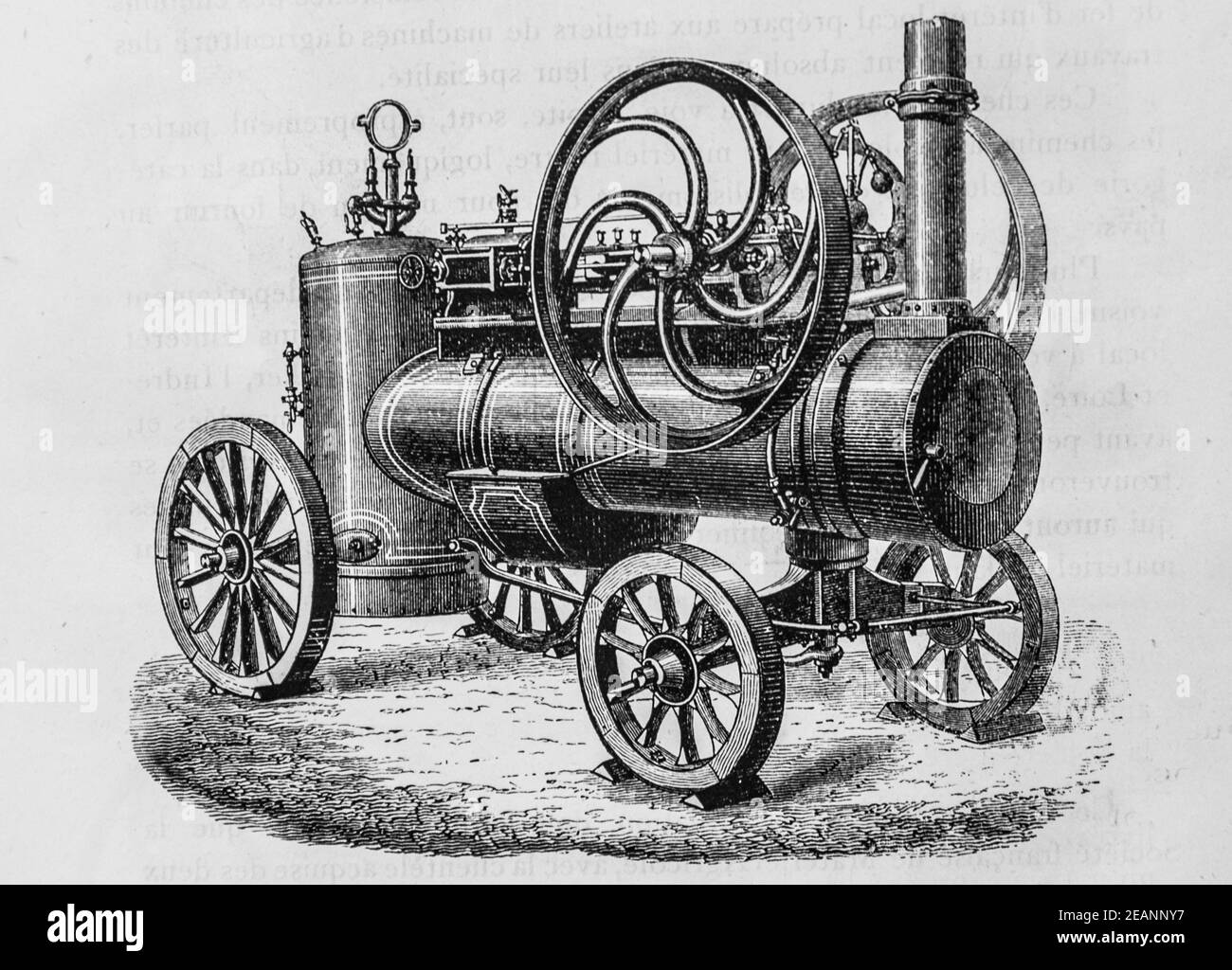 locomotive sur plaque en fonte,avec chaudiere a flammes directs, album agenda industriel,1882,editeur imprimerie tolmer Stock Photo