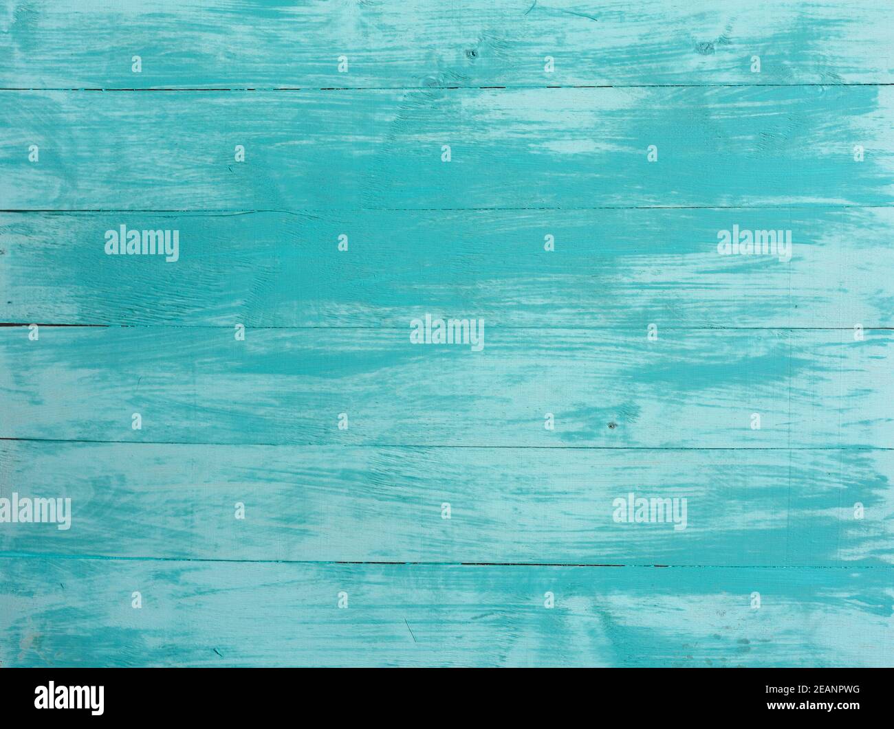 Old vintage turquoise bright color with vertical boards. Grunge wooden background. Stylish shabby background with place for text in prince style. Stock Photo