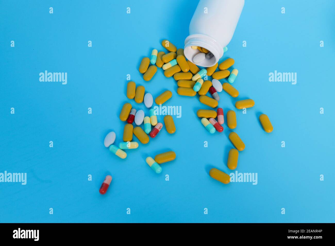 the word of EXPIRY DATE MEDICINE with Pill on blue Background Stock Photo
