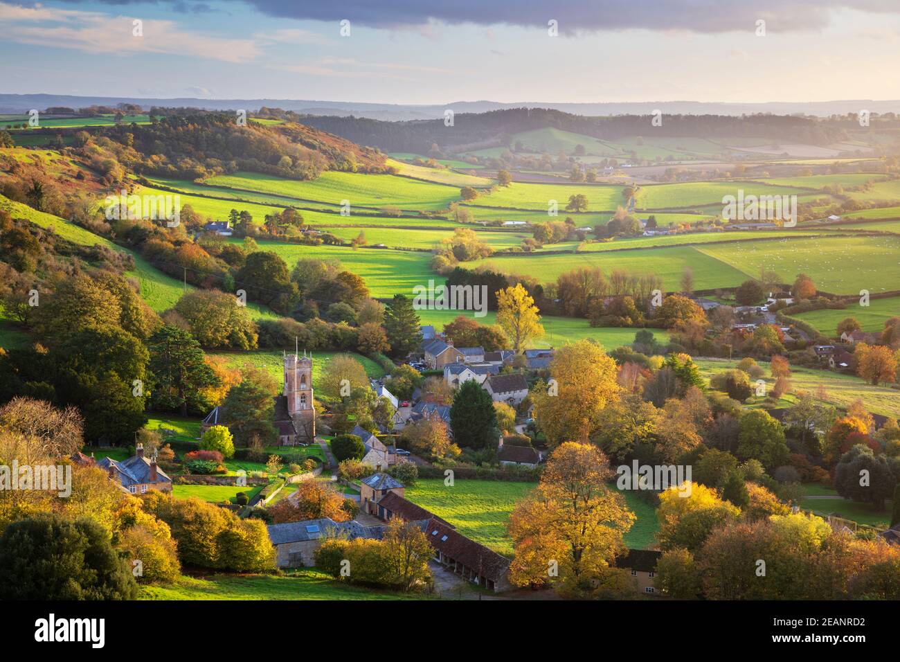 View in autumn over the village of Corton Denham and countryside at sunset, Corton Denham, Somerset, England, United Kingdom, Europe Stock Photo