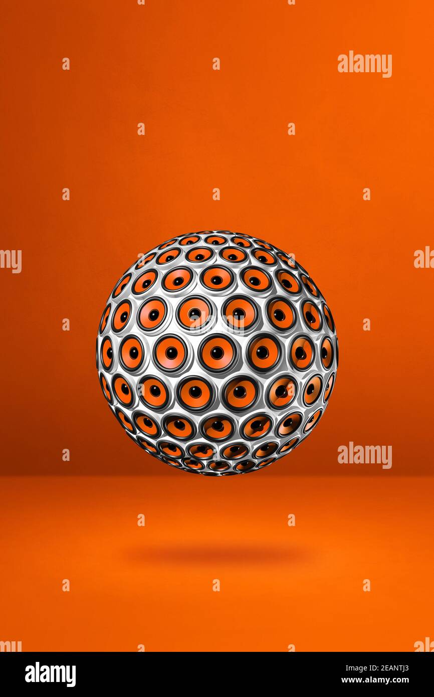 Speakers sphere on a orange studio background Stock Photo
