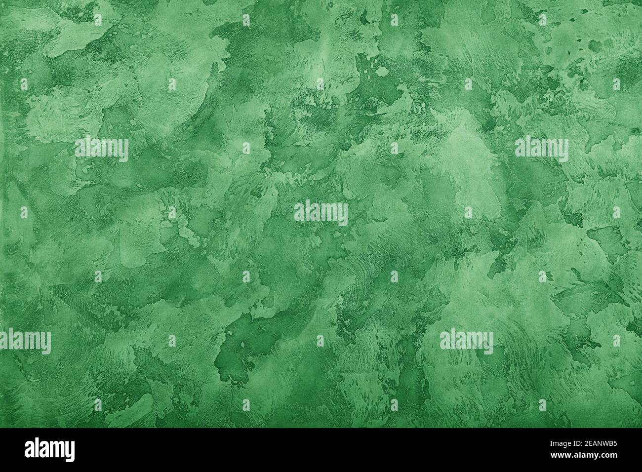 Grunge green painted plaster wall background Stock Photo