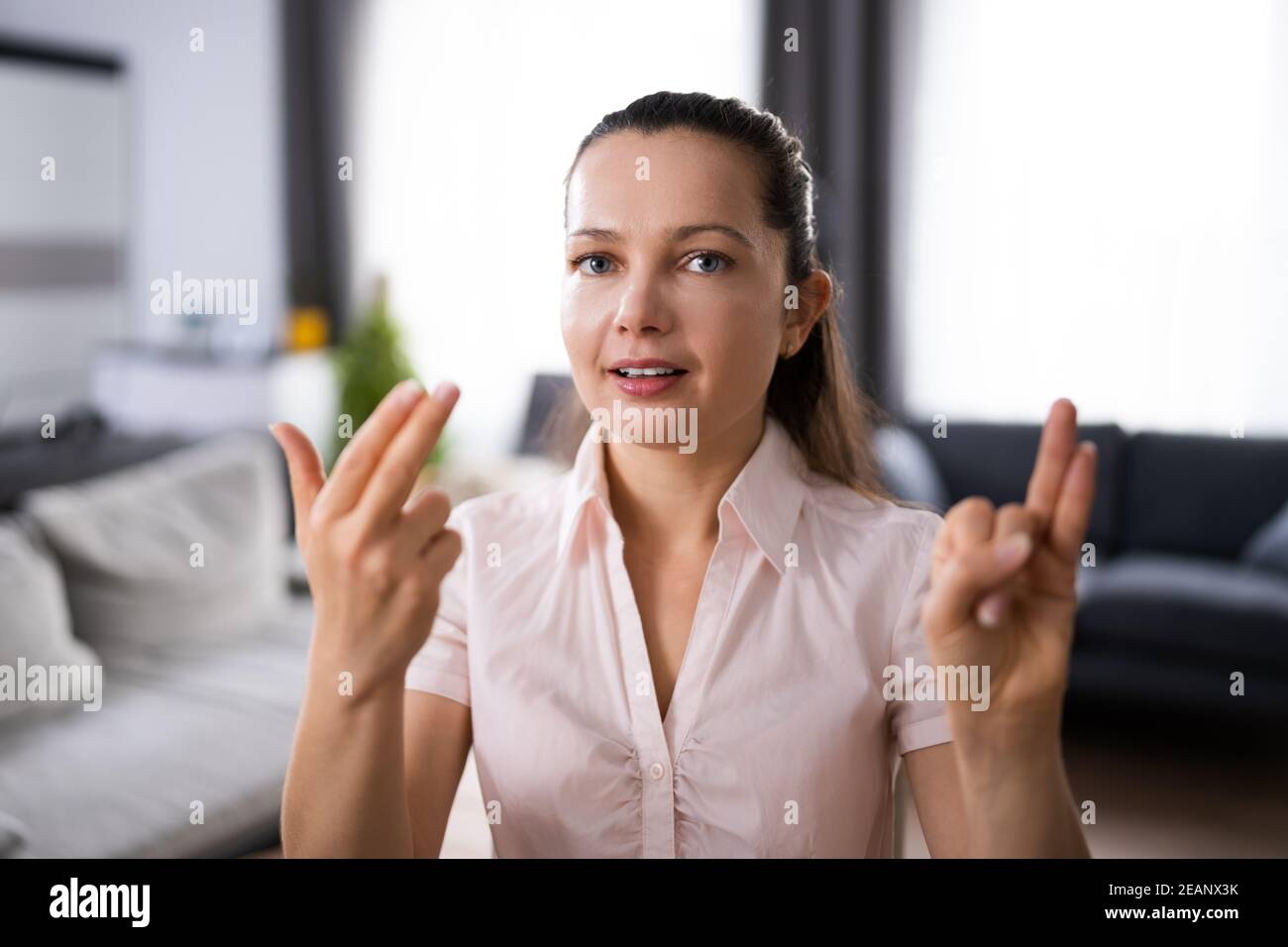 Adult Learning Sign Language Stock Photo