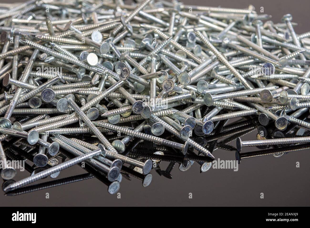 Special Nails, for plaster walls, against black background Stock Photo