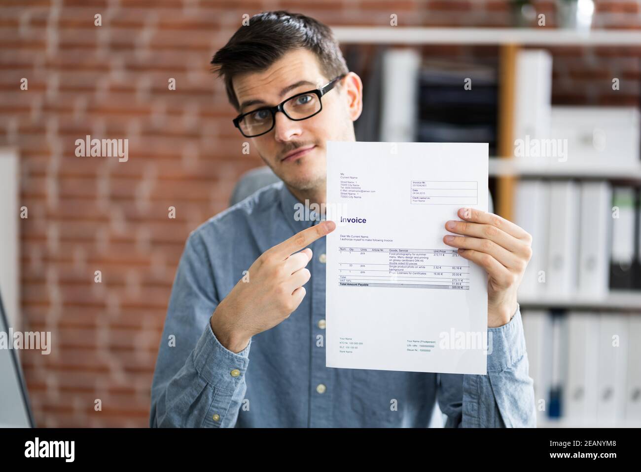 Professional Accountant Showing Sale Tax Invoice Stock Photo