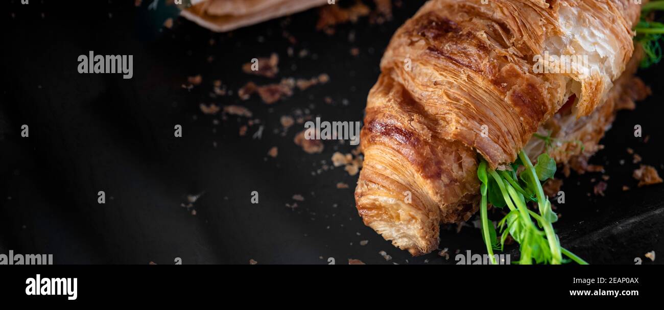 Banner of Delicious fresh baked Croissant with cheese, microgreen