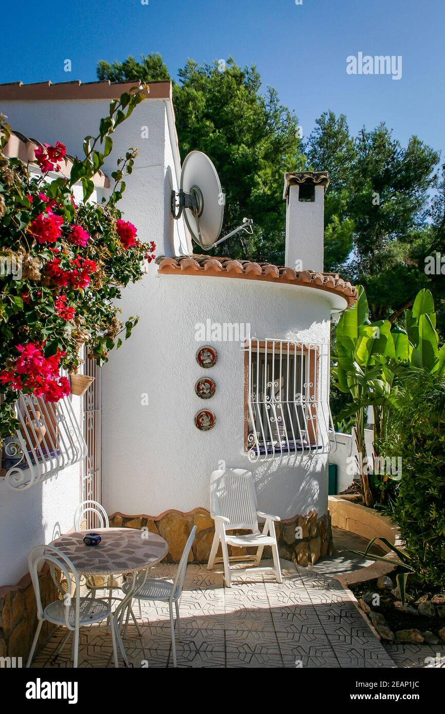 Classic Spanish villa with patio and bougainvillea in Moraira, Spain Stock Photo