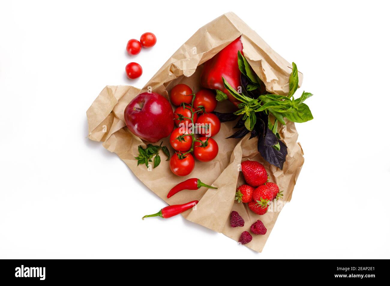 Raw vegetables and fruits in cotton package Stock Photo