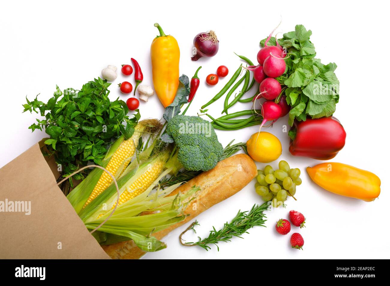 Fresh vegetables and fruits in paper bag, top view Stock Photo - Alamy