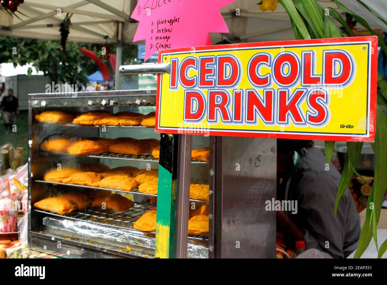 Jamaican patties and ice cold drinks for sale at a food stall Underground Festival in Crystal Palace,South London Stock Photo