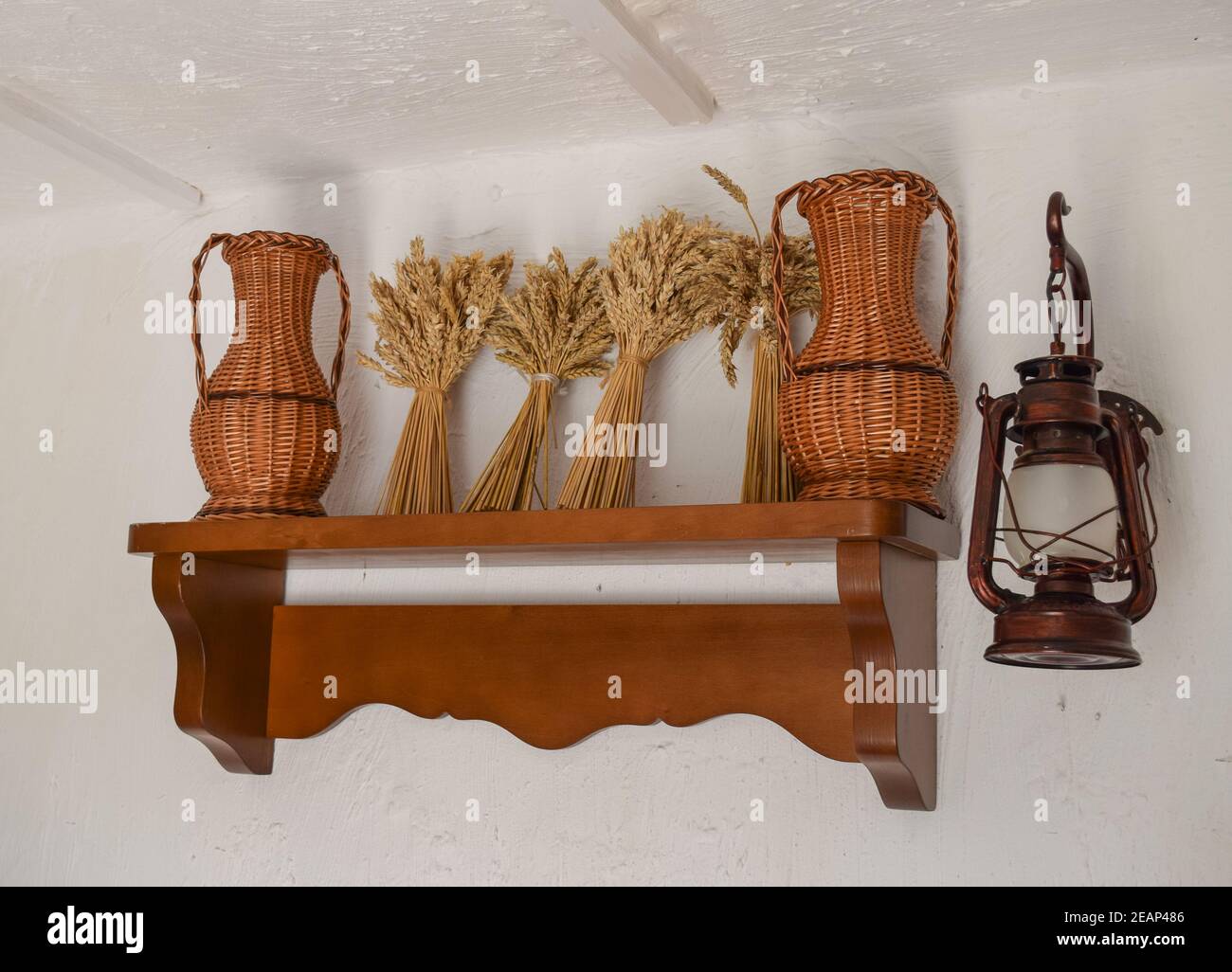 Still life of related wheat ears on the shelf Stock Photo Alamy