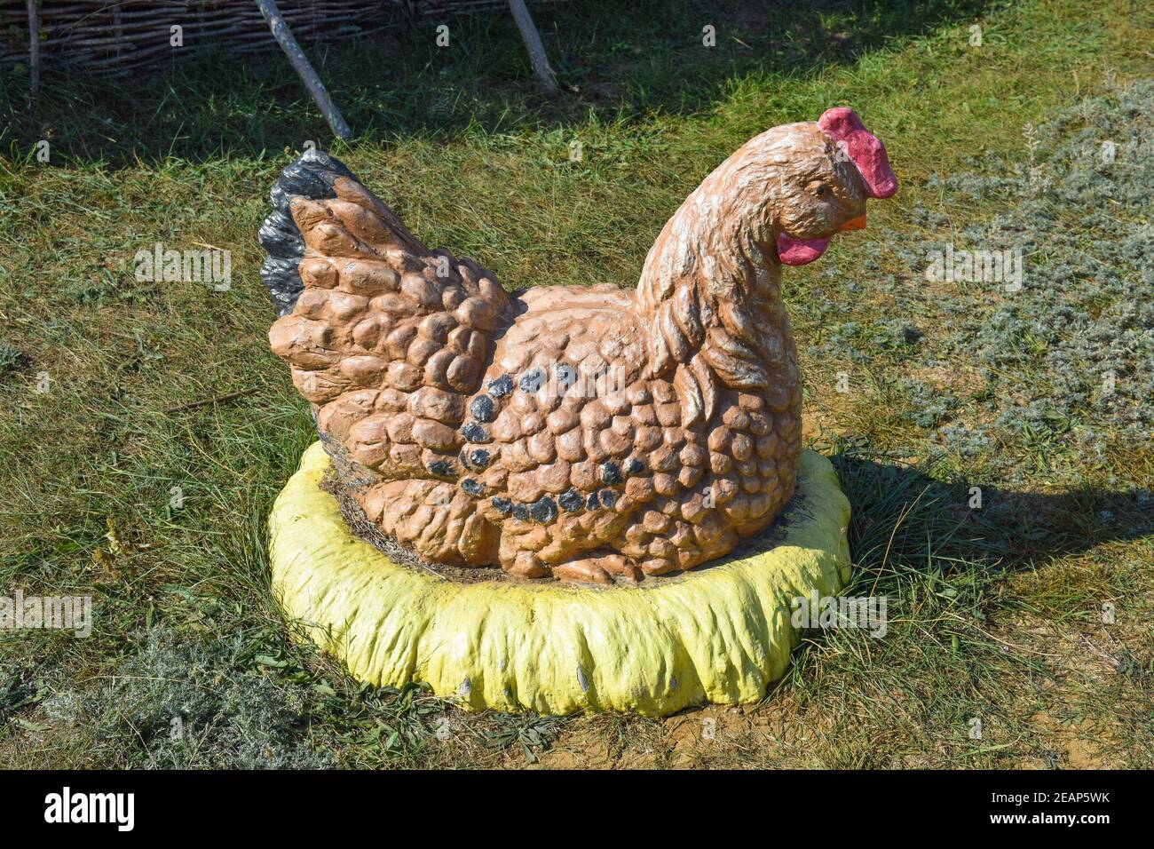 Monument chicken hen. Dummy hen on the nest, the figure of the mother hen Stock Photo